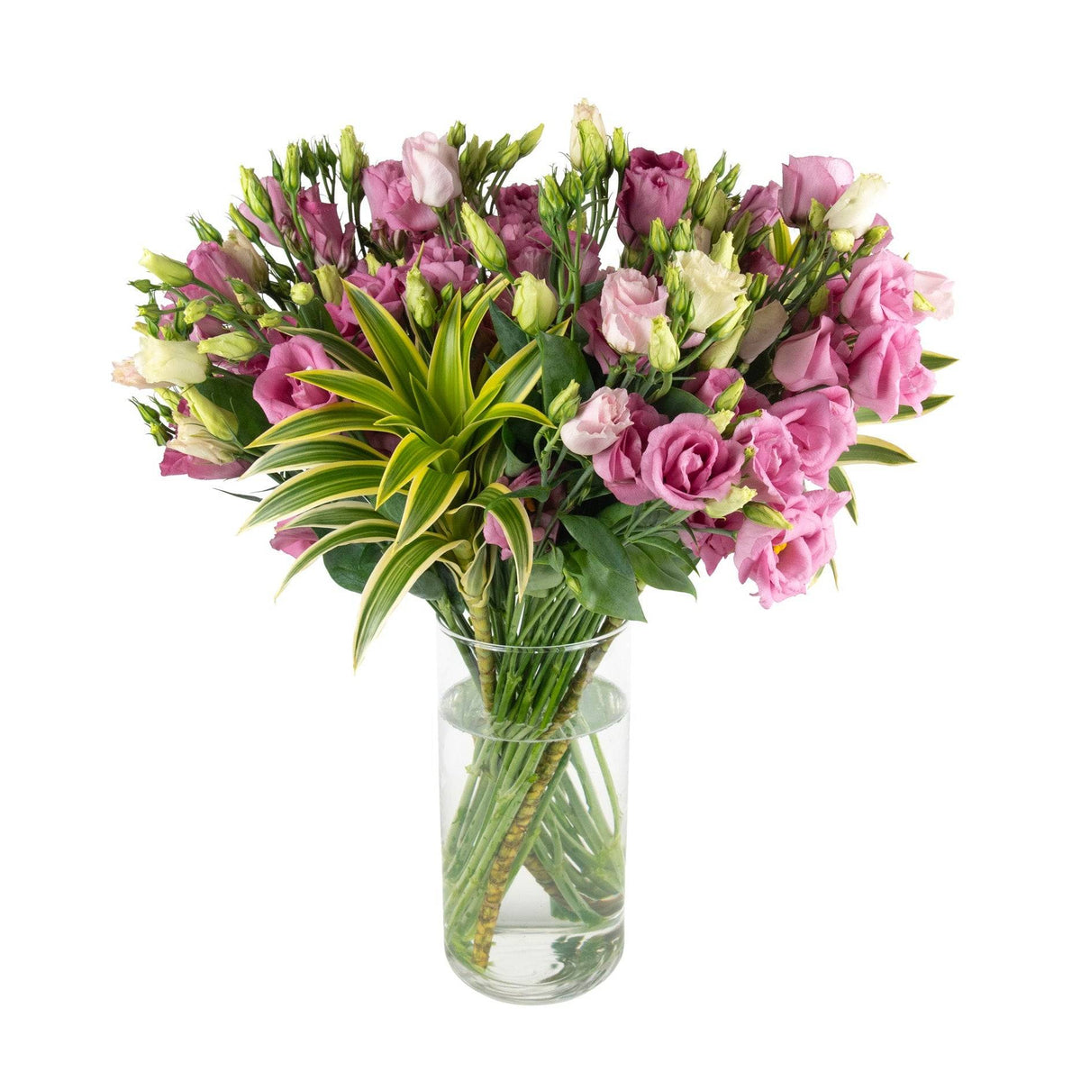 Elegant bouquet of pink and white lisianthus flowers with green foliage in a clear glass vase, perfect for celebrations