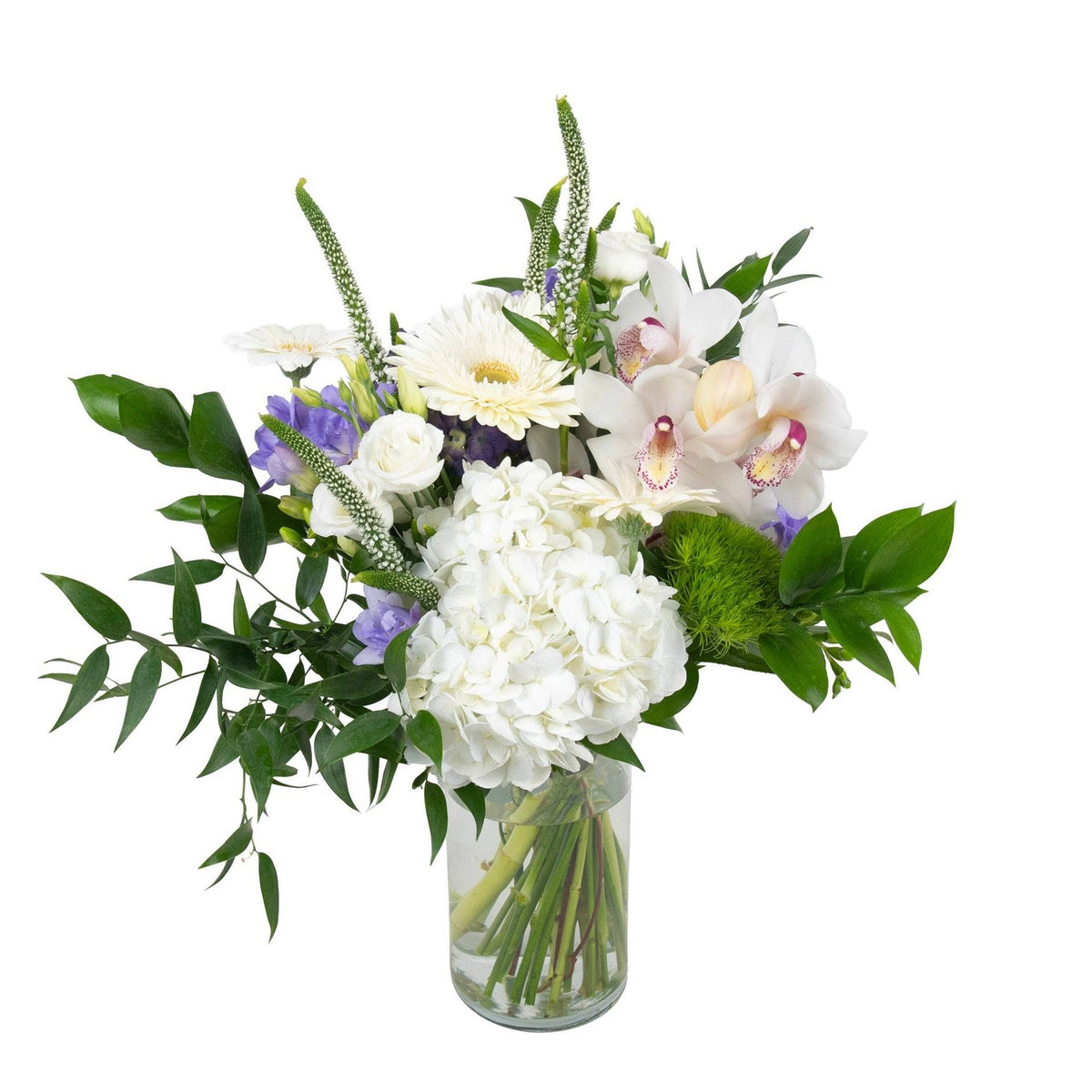 Elegant floral bouquet with white roses, gerbera daisies, purple lisianthus, and greenery in a clear glass vase, perfect for celebrations.