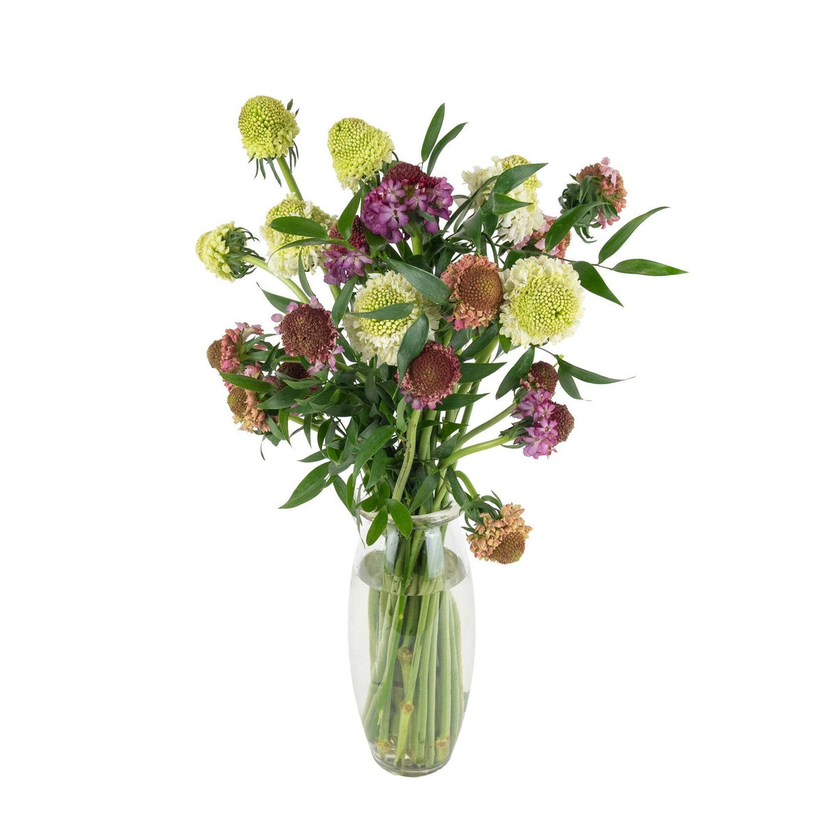 Elegant bouquet of fresh white and burgundy flowers with green foliage in a clear glass vase, perfect for celebrations